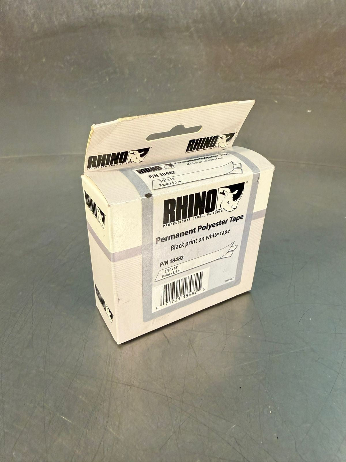 Rhino 18482 9mm x 5,5m Black on White tape Polyester               (3.1.1)