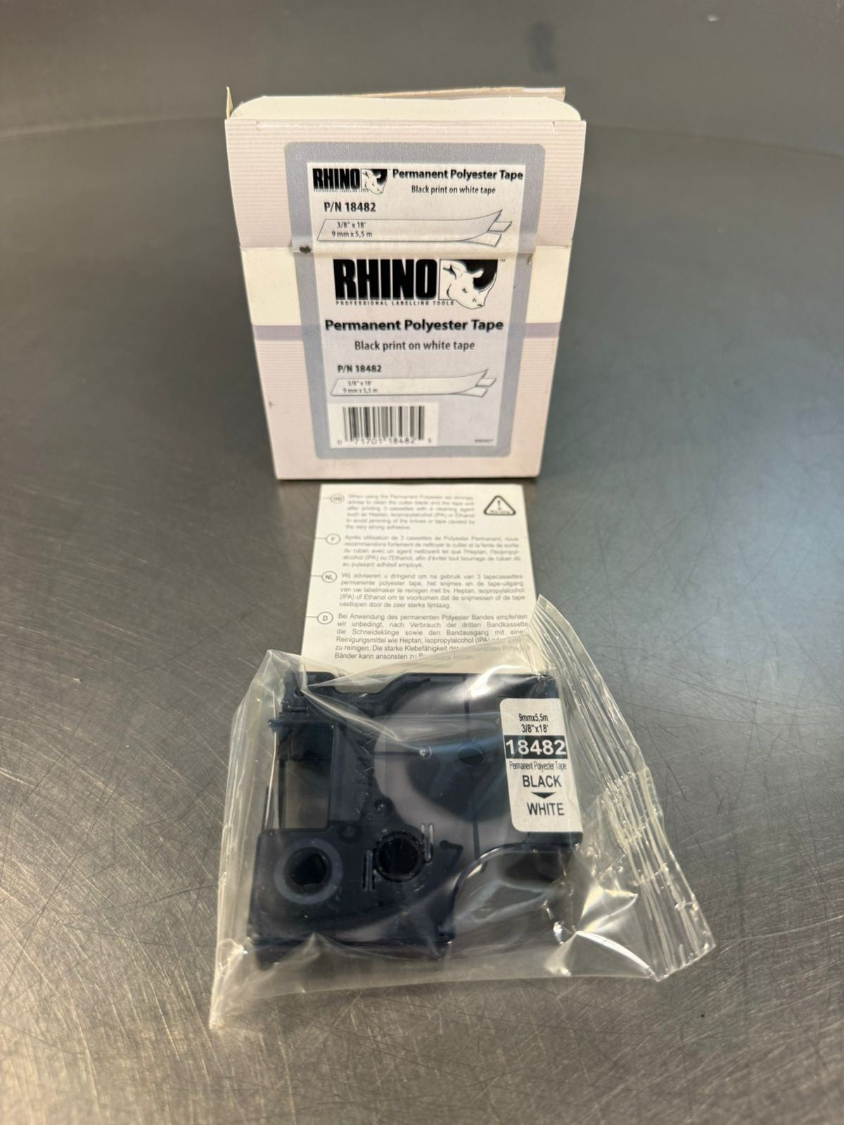 Rhino 18482 9mm x 5,5m Black on White tape Polyester               (3.1.1)