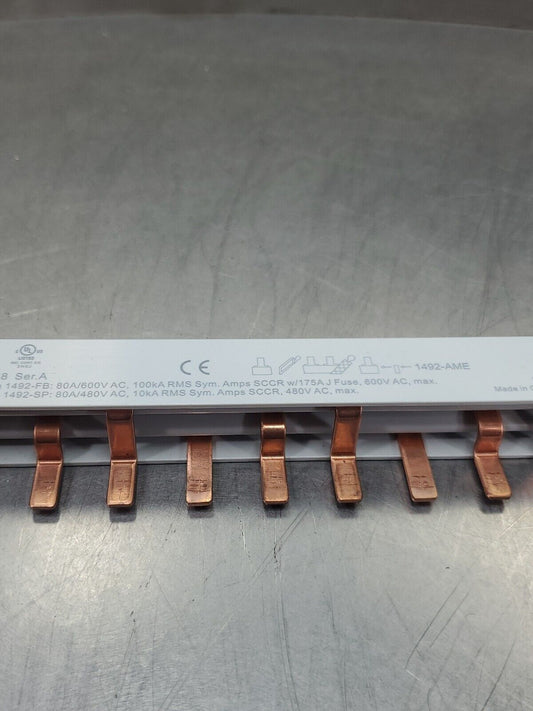 ALLEN BRADLEY 1492-A3B8 SER. A (6.5 IN; 9 PIN) BUS BAR.                     4E-2