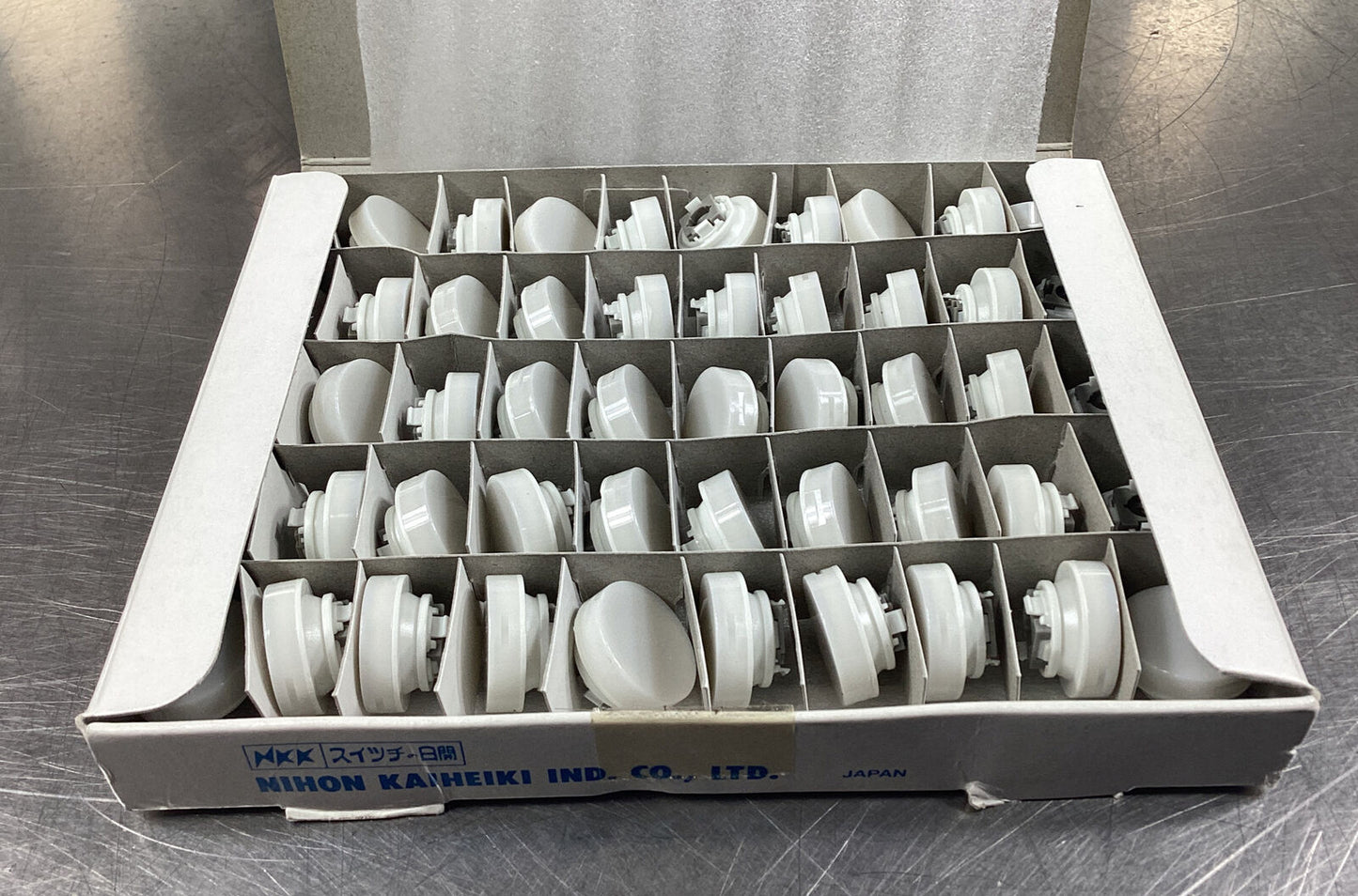 NIHON  AT-4054BJ  CAP PUSHBUTTON ROUND WHITE (box of 50)       4D-25