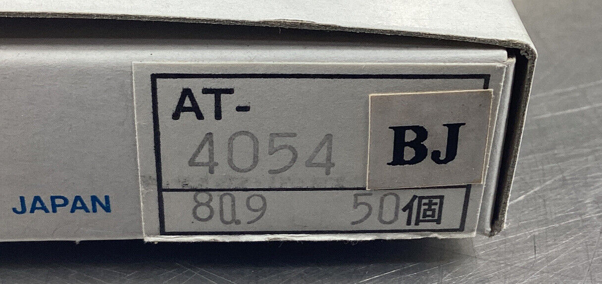 NIHON  AT-4054BJ  CAP PUSHBUTTON ROUND WHITE (box of 50)       4D-25