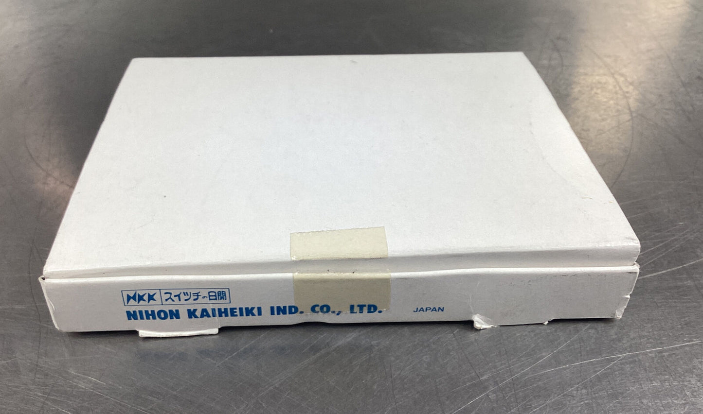 NIHON  AT-4054BJ  CAP PUSHBUTTON ROUND WHITE (box of 50)       4D-25